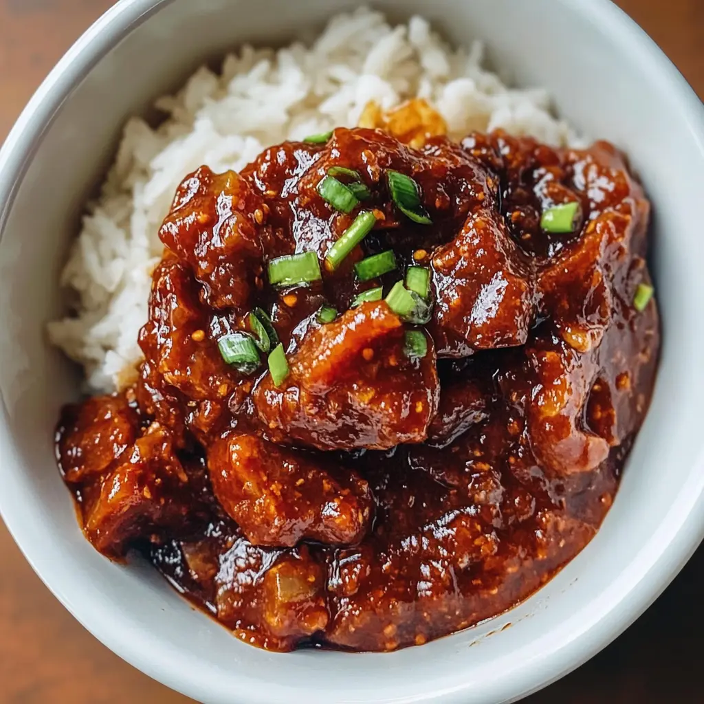 Transform your dishes with this easy homemade Adobo Sauce recipe! Packed with bold flavors from dried chiles, garlic, and spices, this versatile sauce elevates meats, veggies, and even beans. Perfect for marinating or as a dipping sauce, it's a must-try for flavor lovers. Save this recipe for a delicious addition to your next meal or gathering!